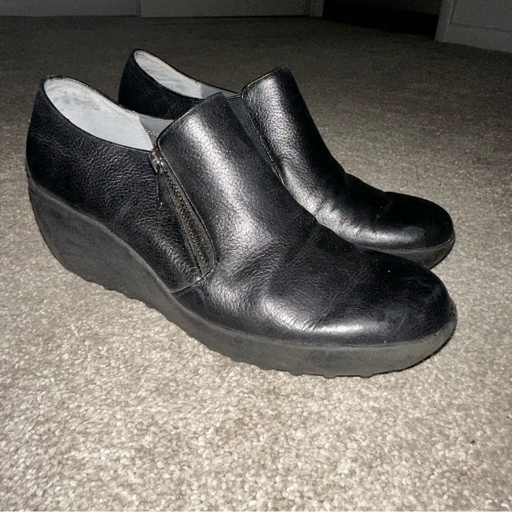 Black clogs with zipper on side
